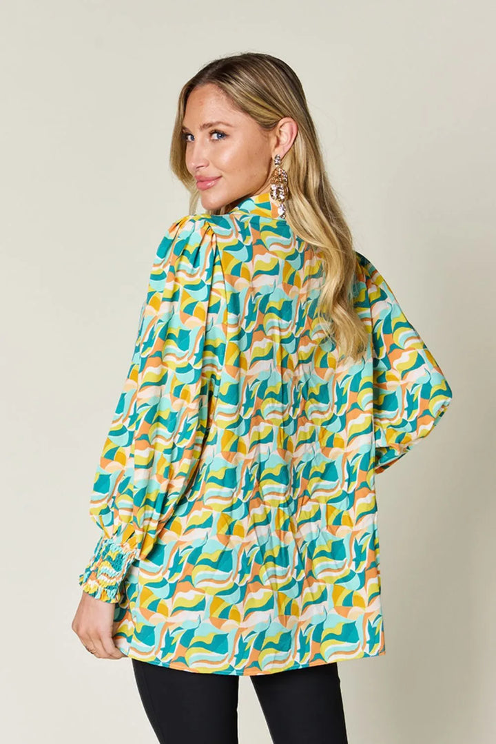 Abstract print smocked balloon sleeve blouse