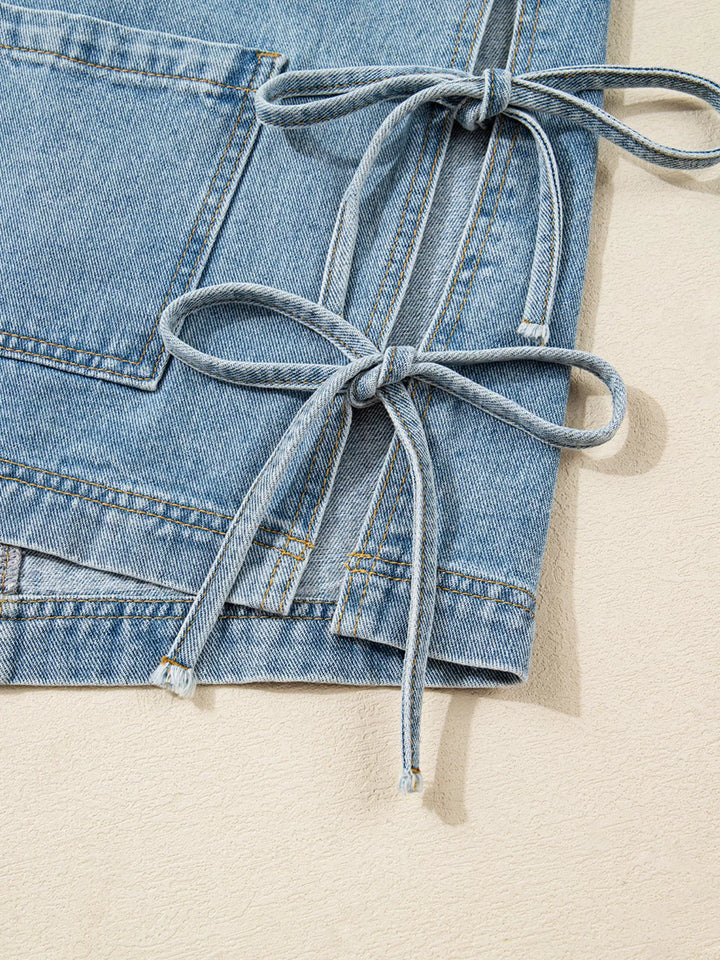 Oversized denim jacket with patch pockets and side ties