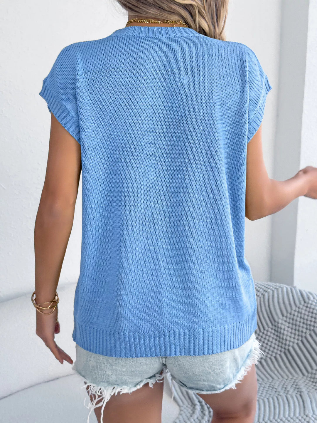 Floral cap-sleeve knit sweater with ribbed crew neck