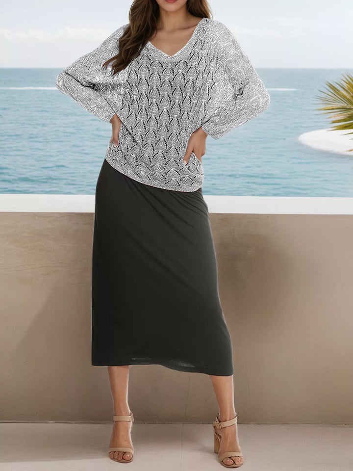 Open-knit V-neck pullover sweater with dolman sleeves