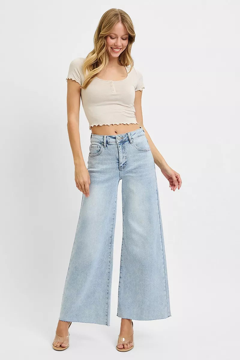 High-rise wide-leg palazzo jeans with raw ankle hem
