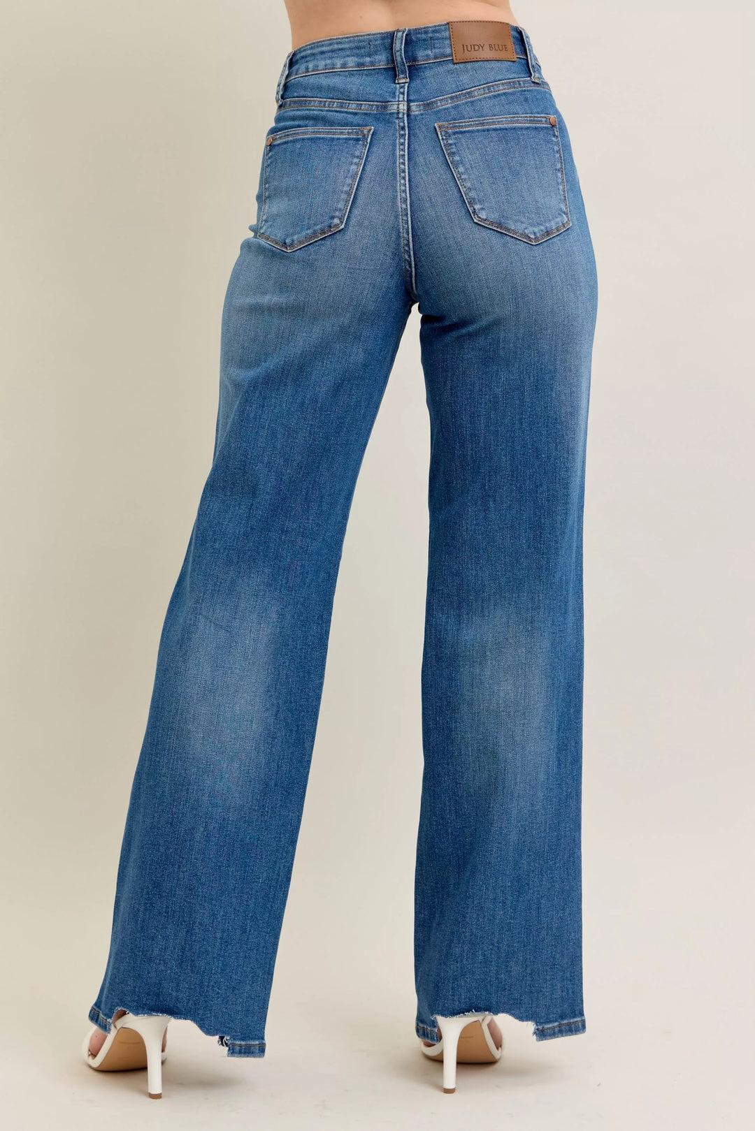 High-rise tummy control wide leg jeans with raw chewed hem