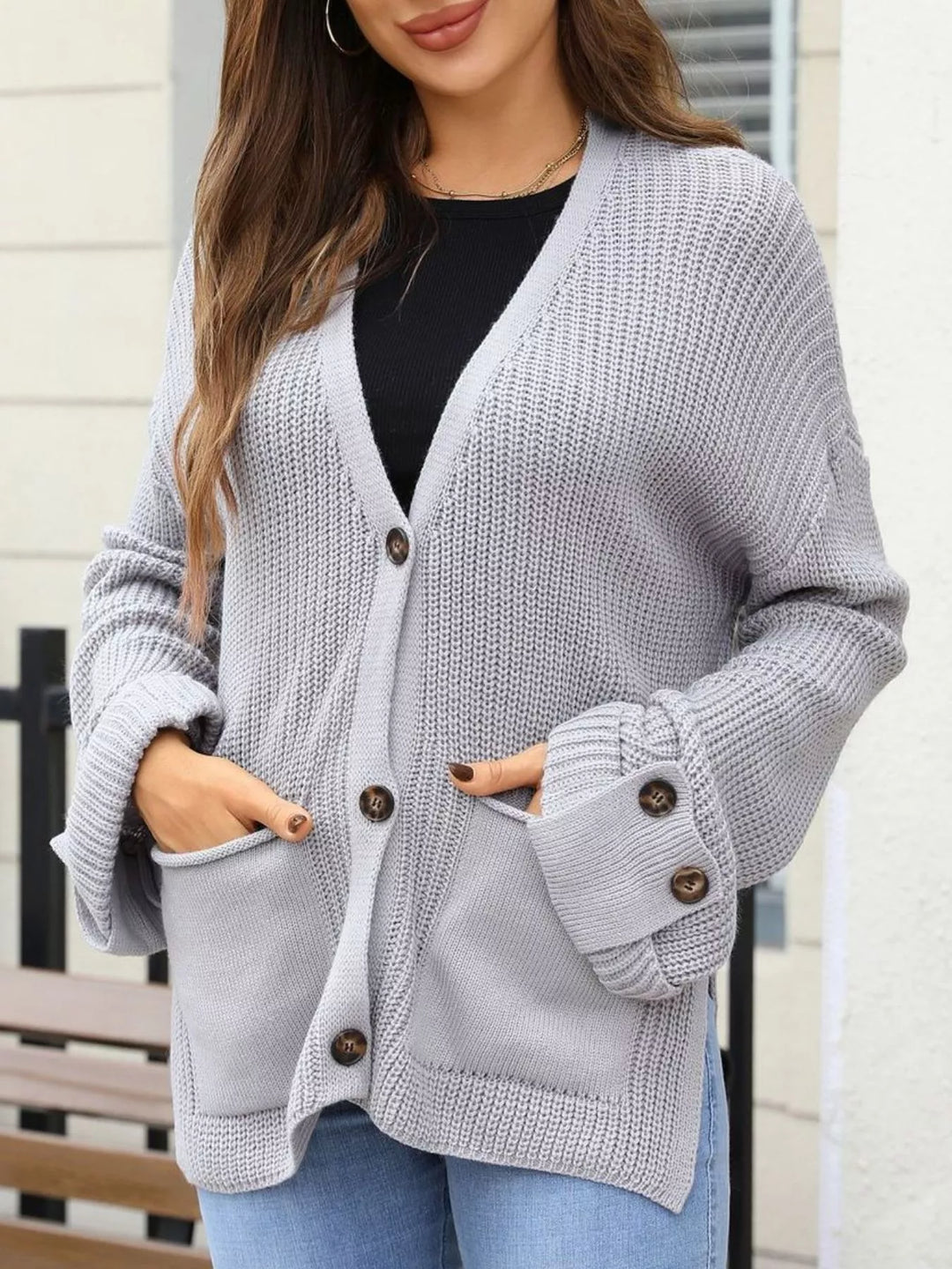 Oversized ribbed knit button-down cardigan with pockets