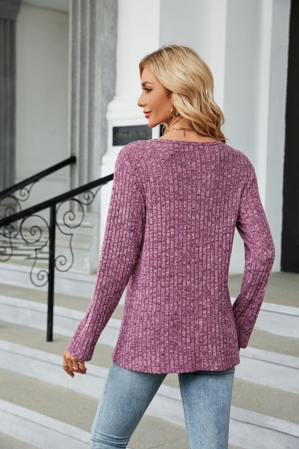 Ribbed knit long sleeve top with side buttons and slit hem