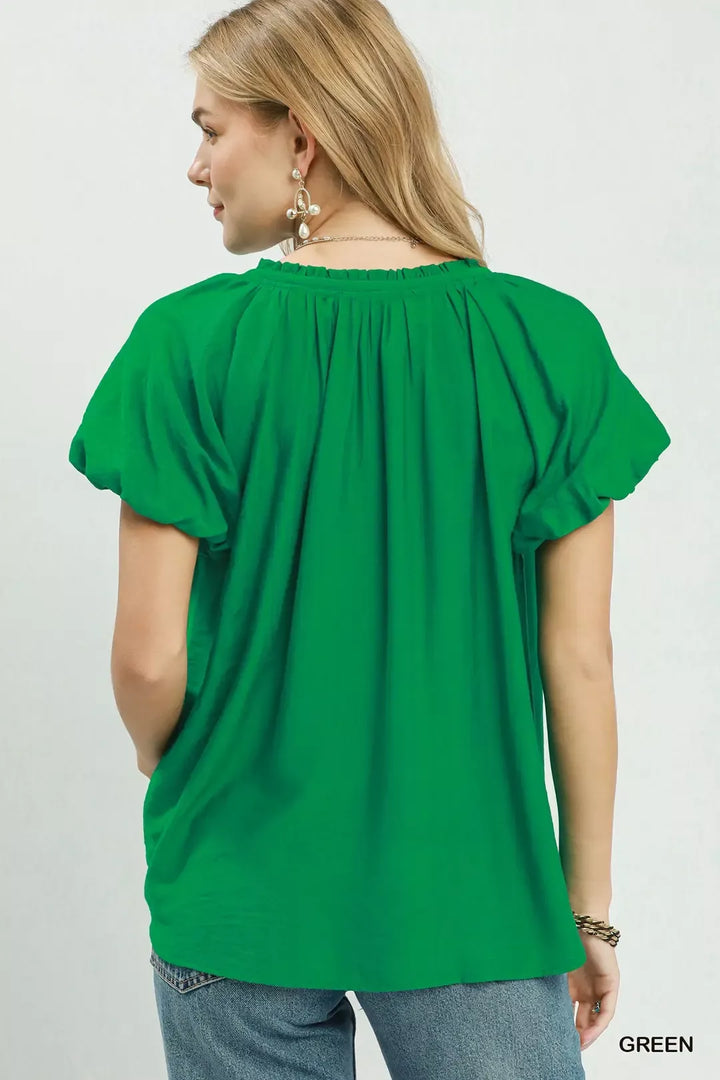 Gathered v-neck top with flutter sleeves