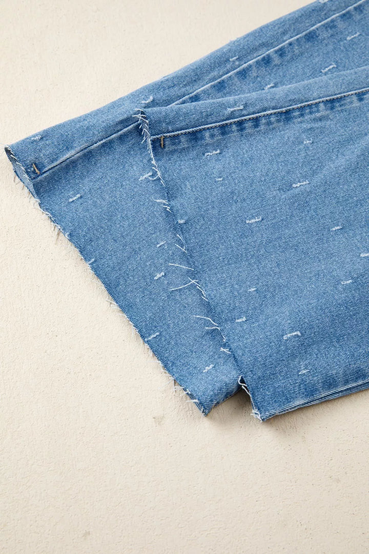 Distressed wide-leg jeans with tummy control and raw hem