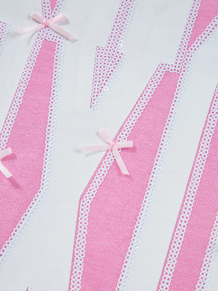 Oversized XOXO graphic sweatshirt with exposed seams and bows