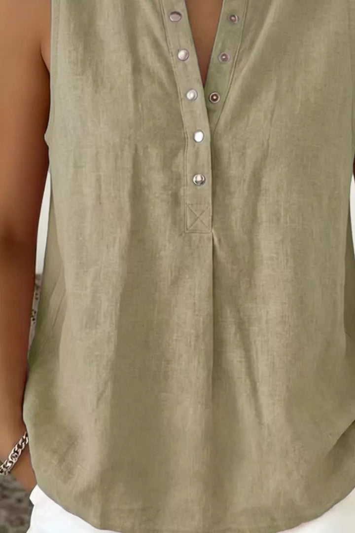 Snap-front sleeveless blouse with V-neckline