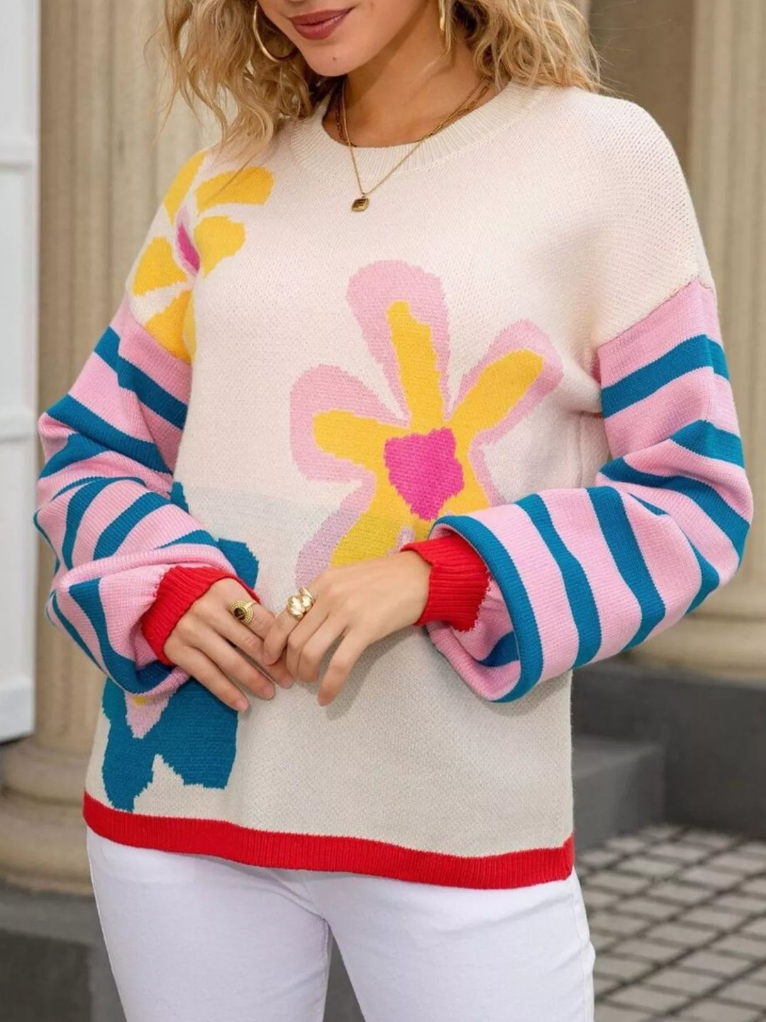 Mod floral crew neck sweater with striped sleeves