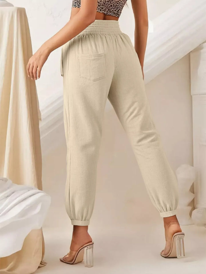 Wide-leg smocked waist casual pants in textured weave