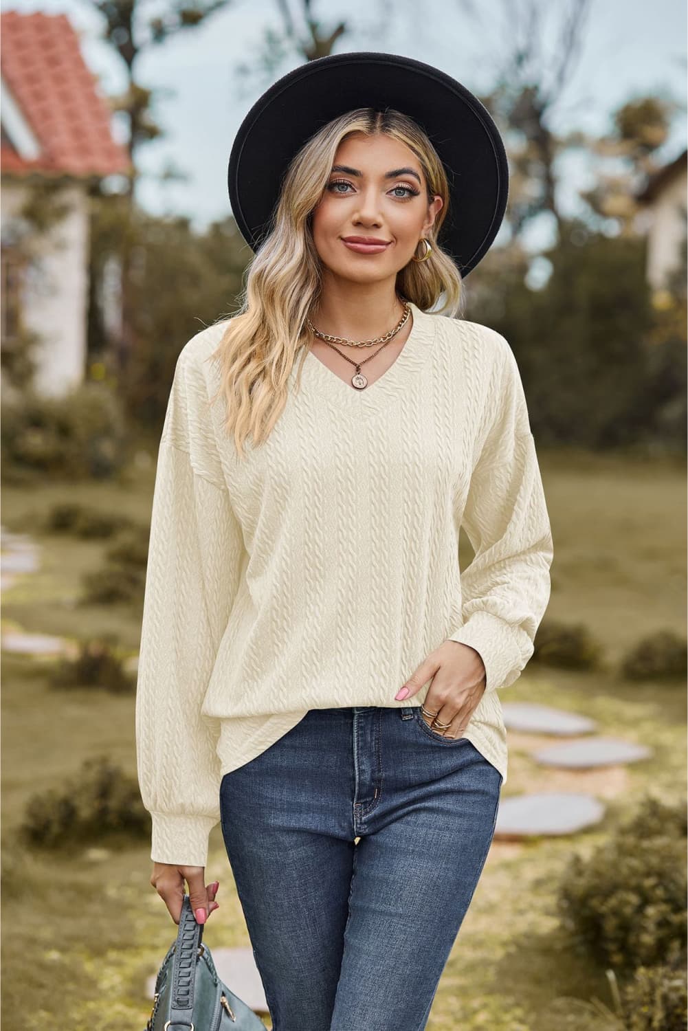 Ivory Textured knit V-neck top with dropped shoulders