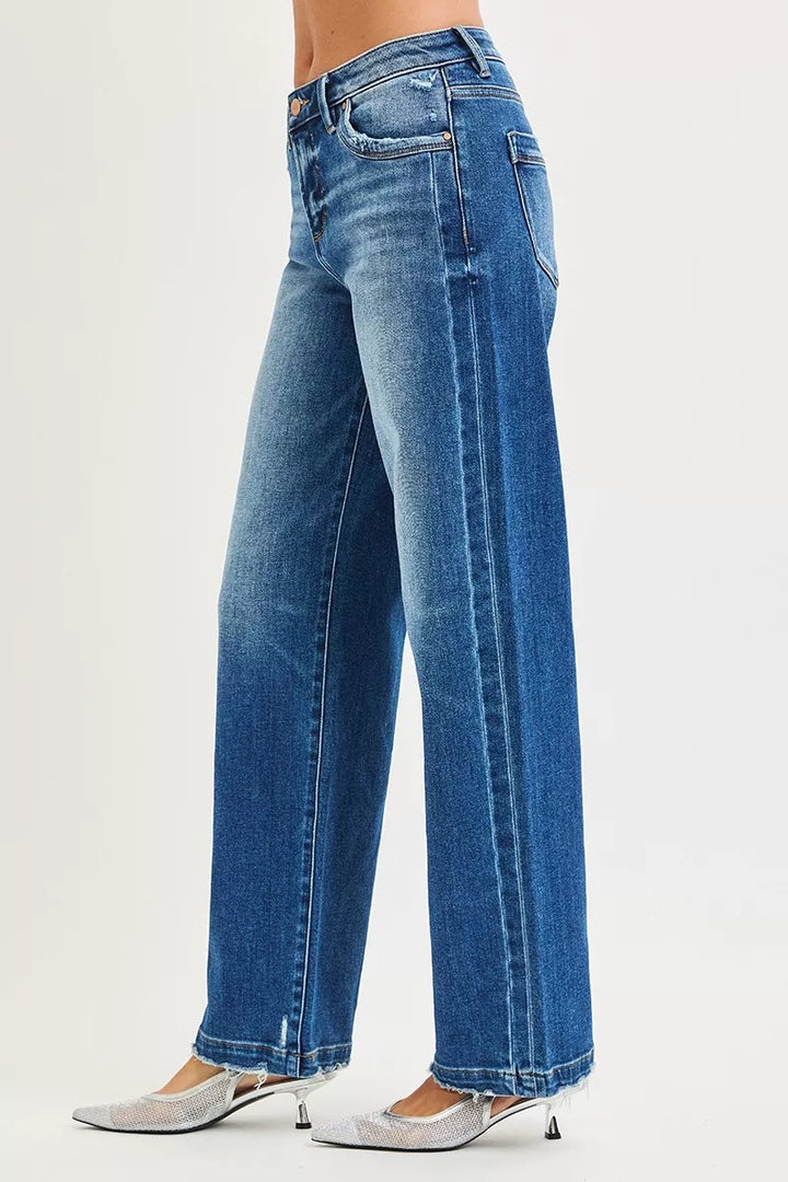 Slouchy wide-leg baggy jeans with raw hem and side seam detail