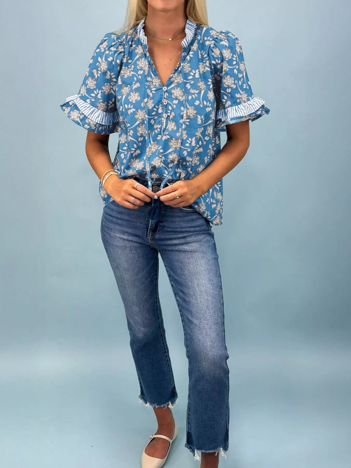 Floral print blouse with ruffle sleeves and split neck tie