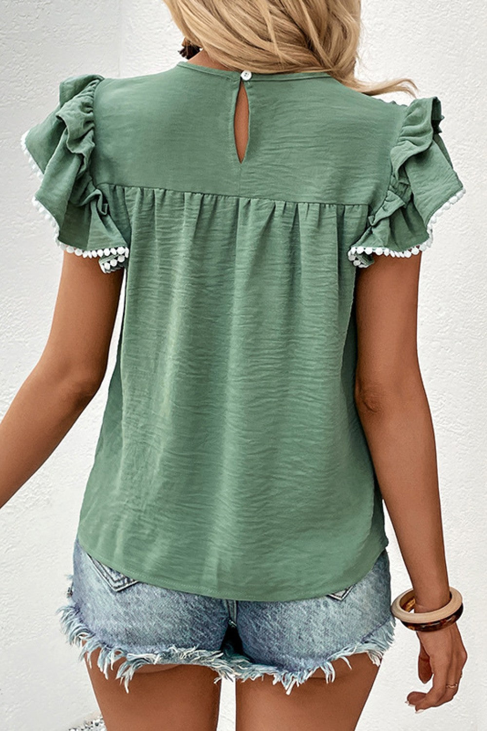 Pintuck pleated flutter sleeve blouse with scalloped trim