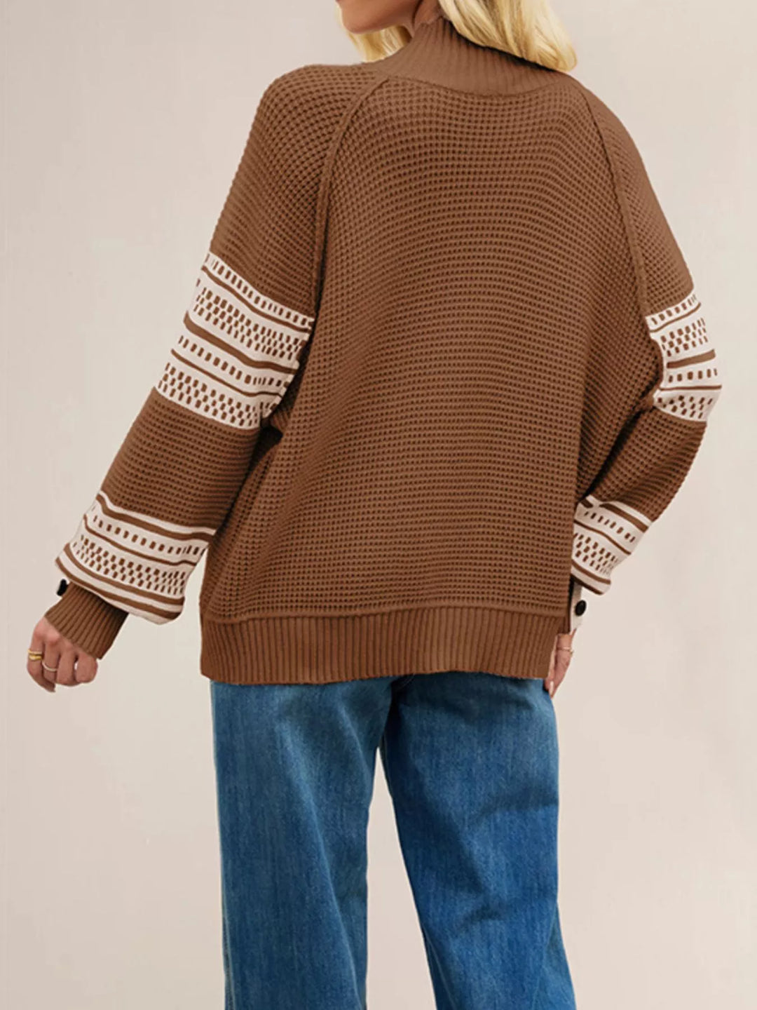 Color-block waffle knit mock neck sweater with button cuffs