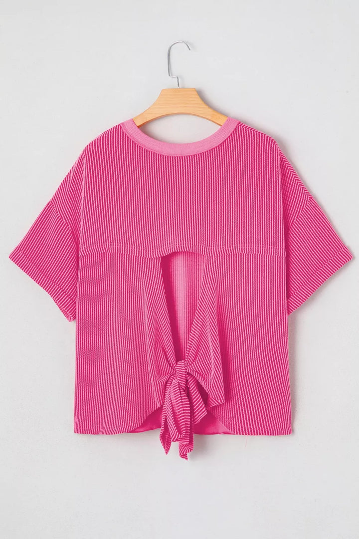 Ribbed knit short sleeve top with cutout bow-tie back
