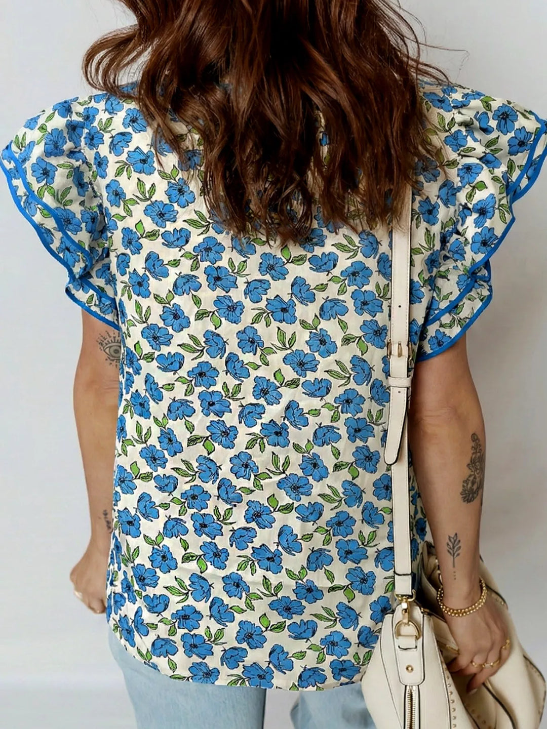Floral ruffle flutter sleeve tie-neck blouse