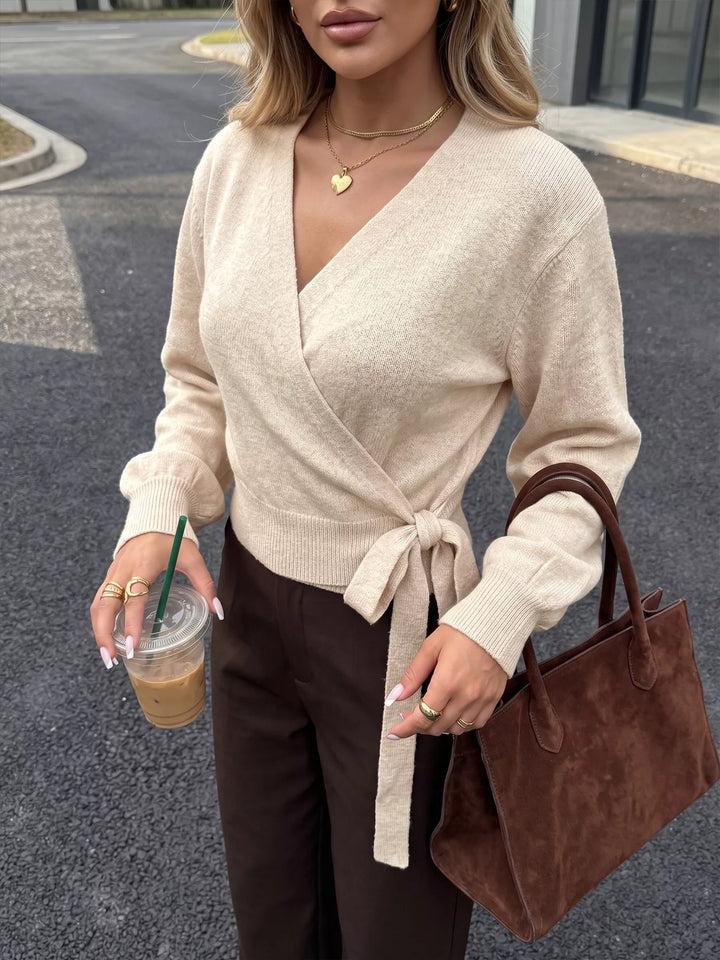 Surplice wrap sweater with side tie and drop shoulders
