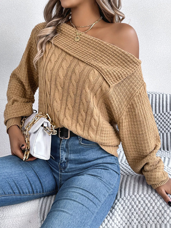 Cable knit one-shoulder sweater with fold-over ribbed collar