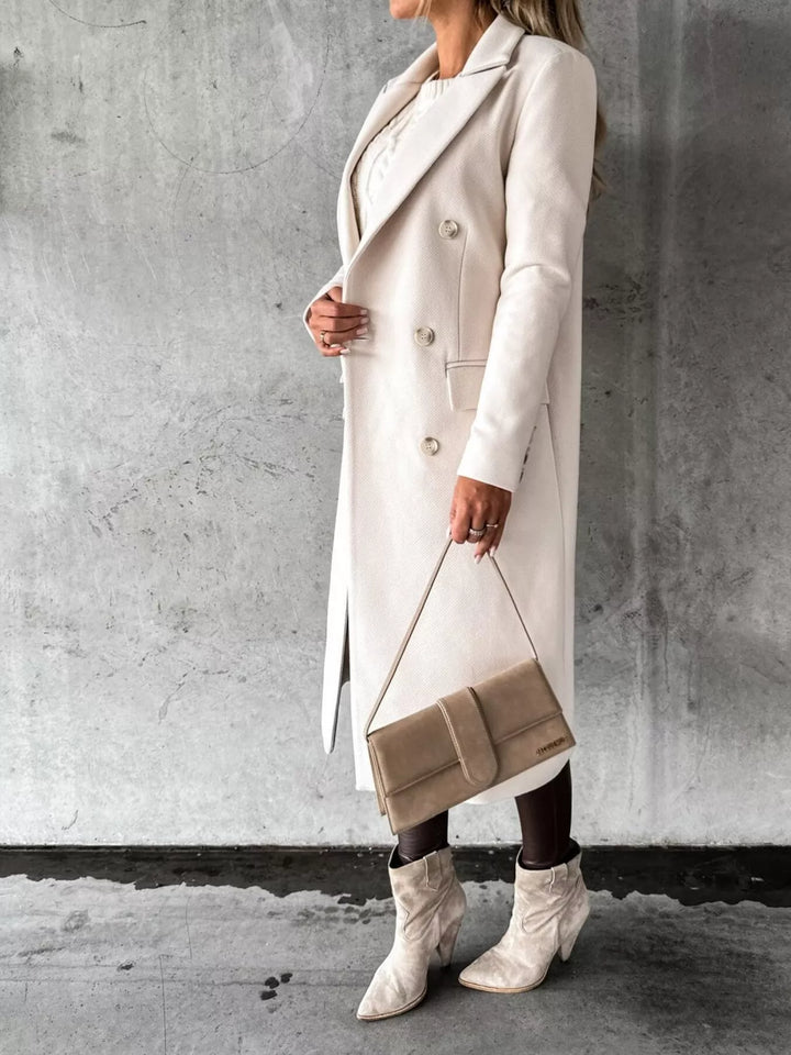 Double-breasted longline coat with notch lapel and flap pockets