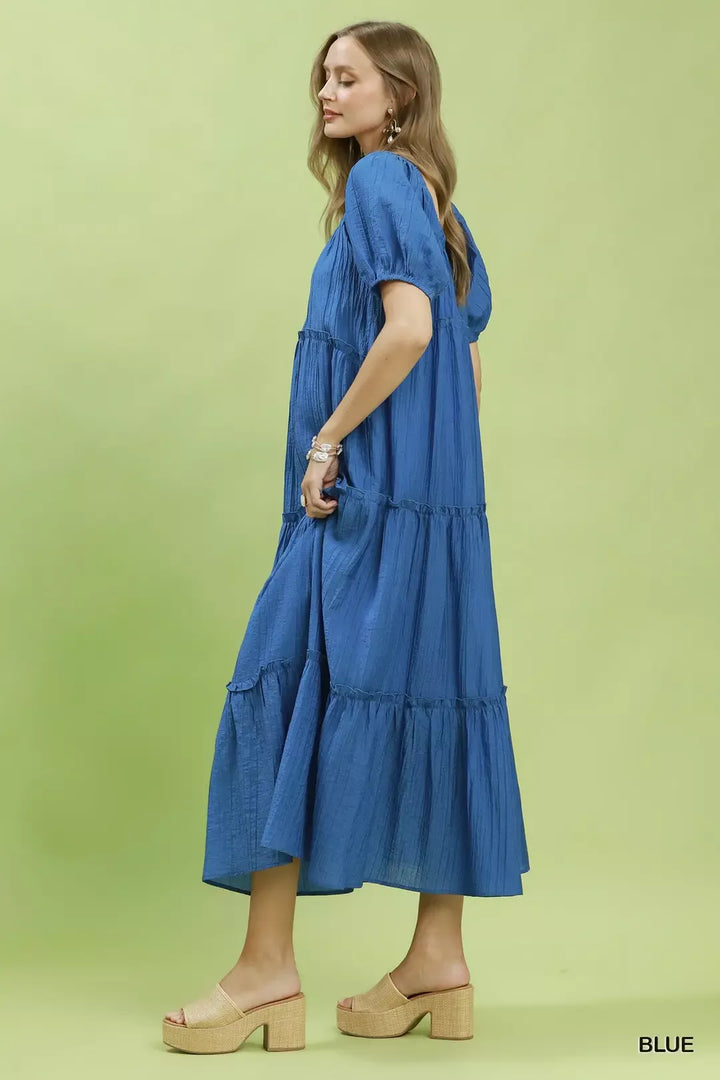 Textured tiered midi dress with puff sleeves and pockets