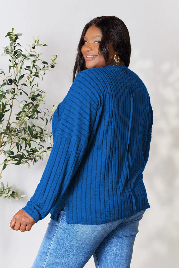 Ribbed knit round neck tunic top with side slits