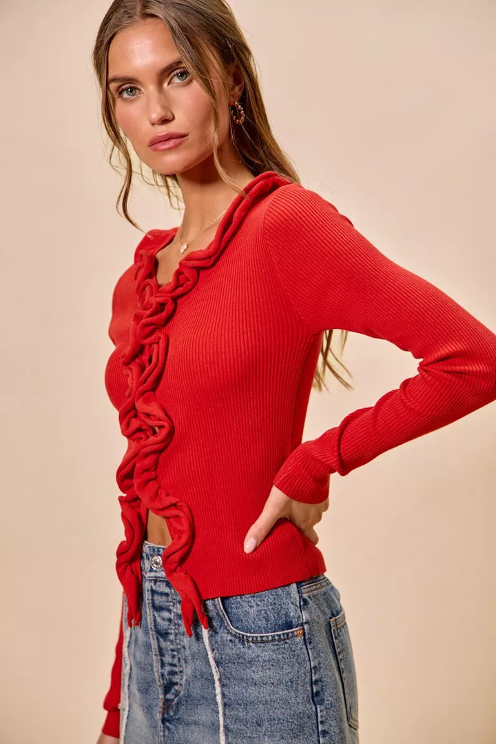 Ribbed knit cardigan with cascade ruffle trim