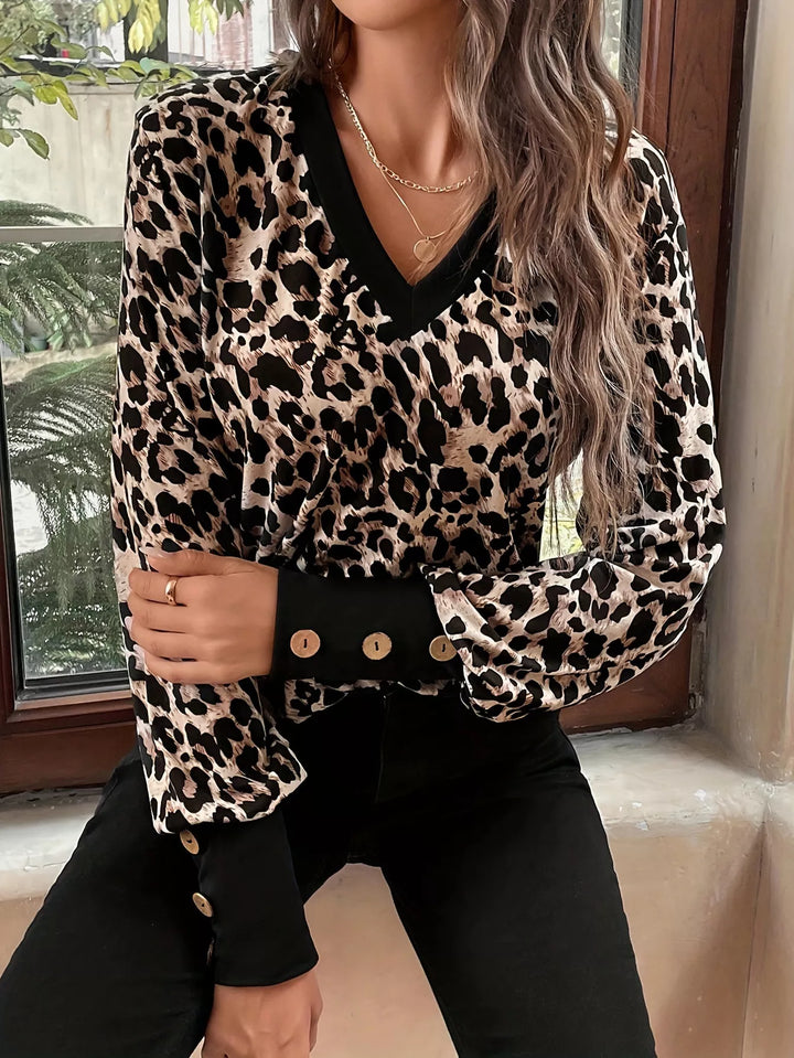 Leopard print V-neck long sleeve top with button cuffs