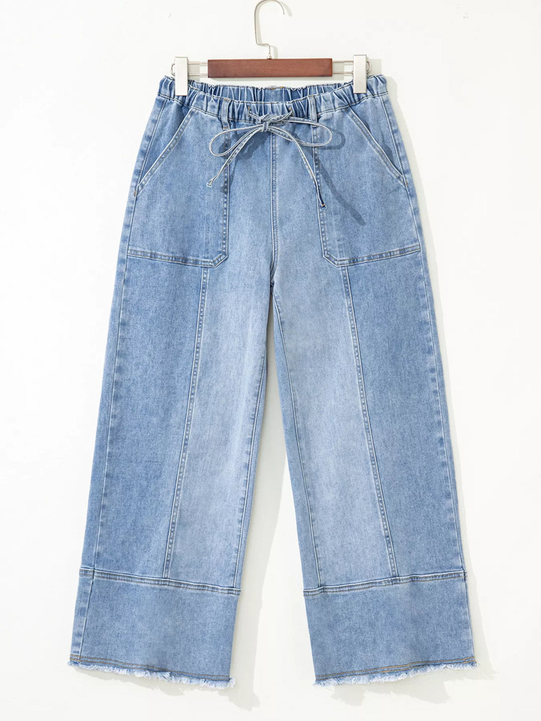 Wide-leg drawstring jeans with raw frayed hem