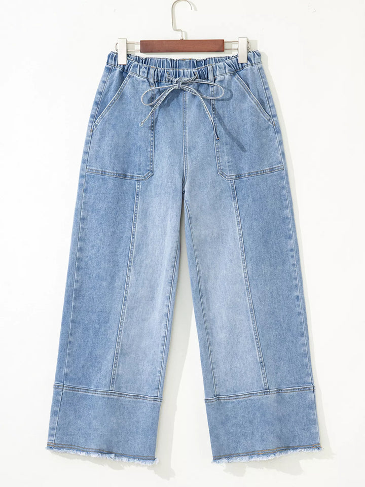 Wide-leg drawstring jeans with raw frayed hem