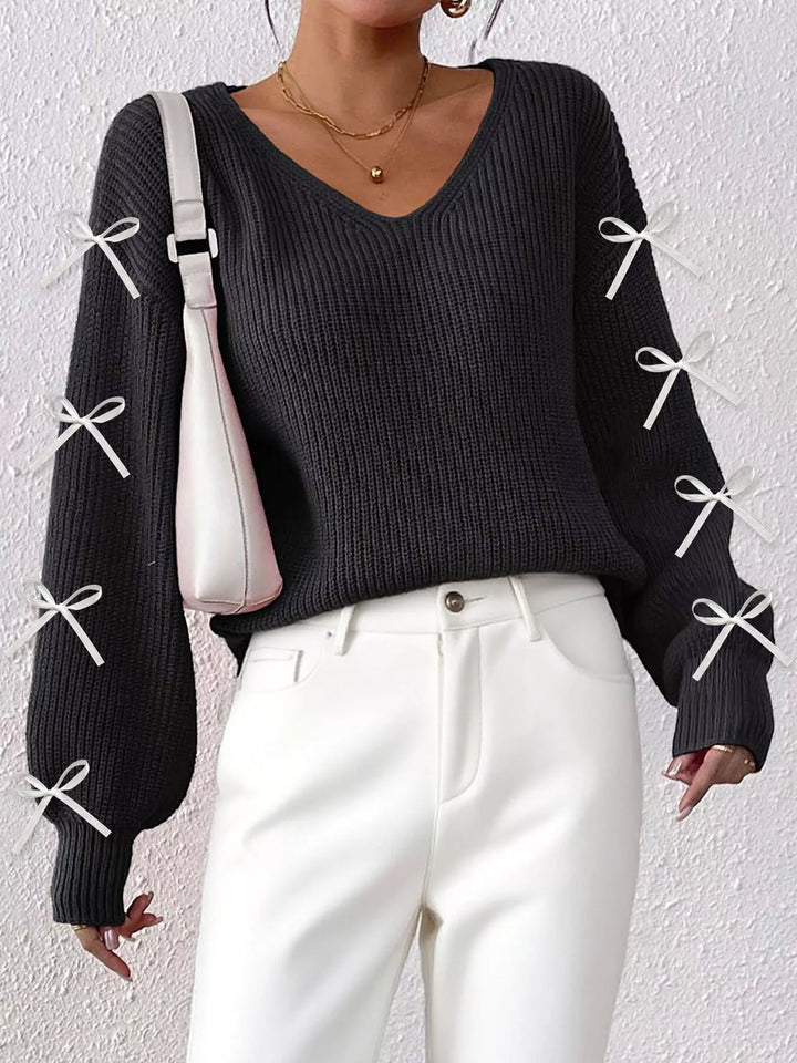 Ribbed knit V-neck sweater with bow-tie sleeves