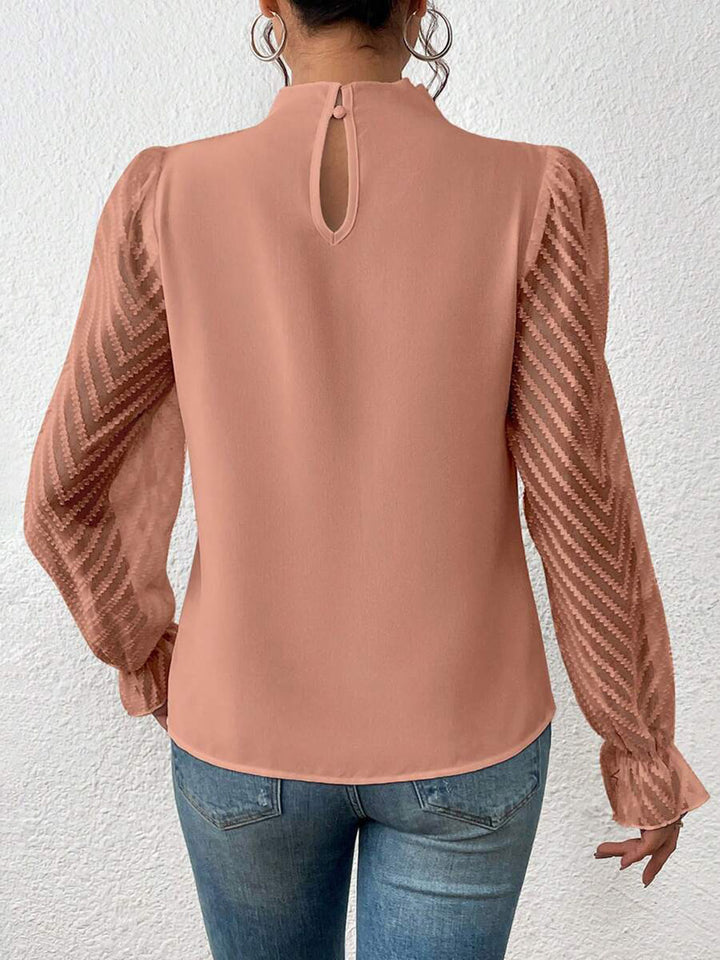 Mock neck blouse with sheer textured flounce sleeves