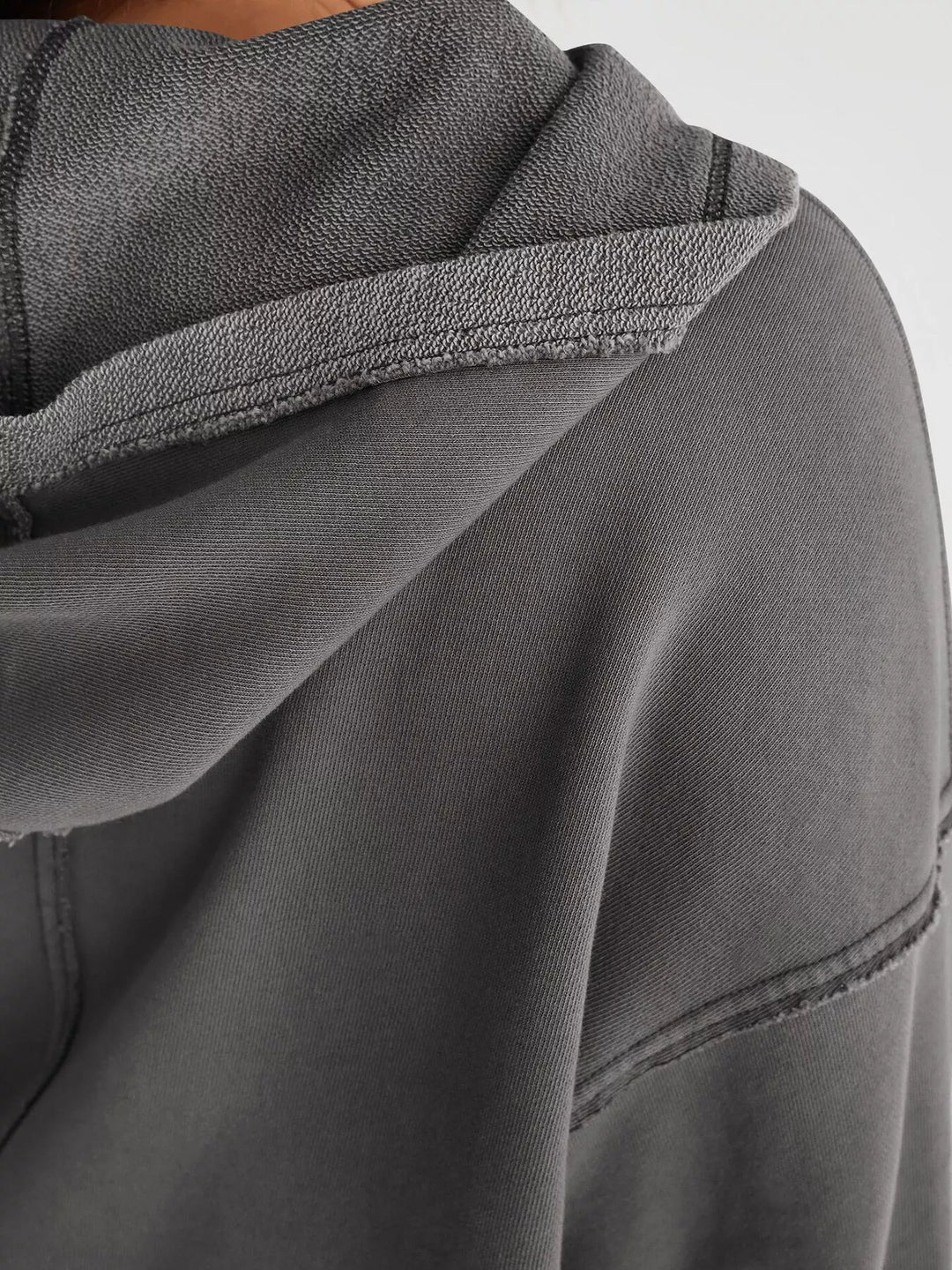 Cropped exposed-seam pullover hoodie with split neck