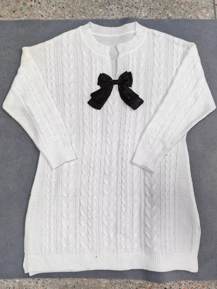Cable knit sweater dress with contrast bow and side slits