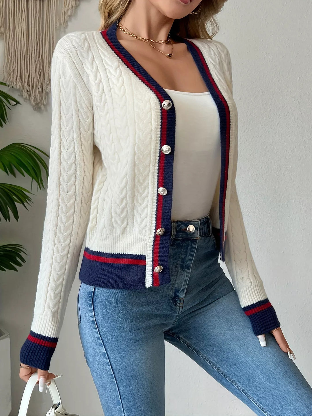 Cable knit cardigan with contrast trim and gold buttons