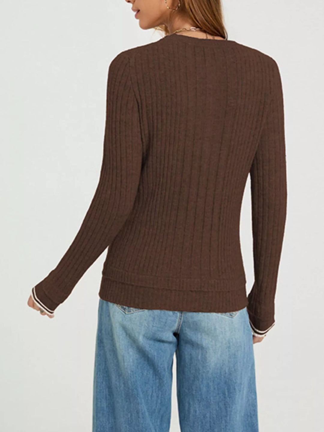 Ribbed knit henley sweater with button placket
