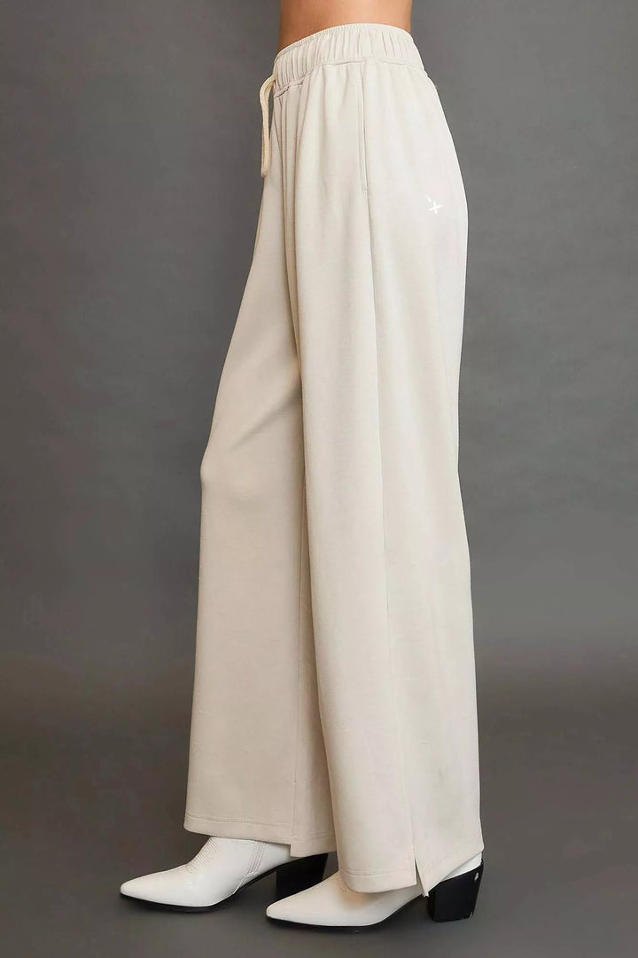 Drawstring wide-leg pants with side slits and pockets