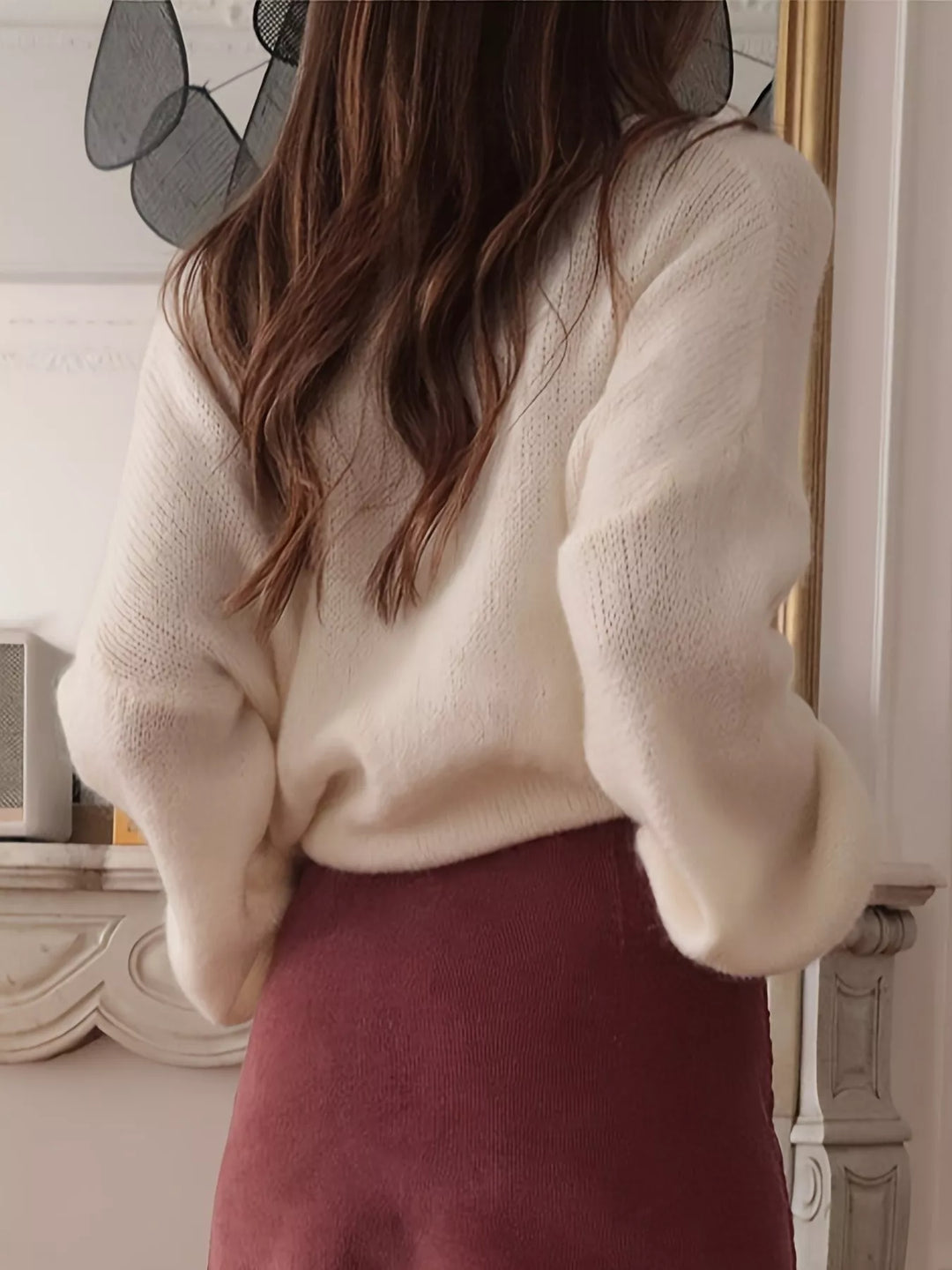 Oversized turtleneck sweater with dropped shoulders and ribbed cuffs
