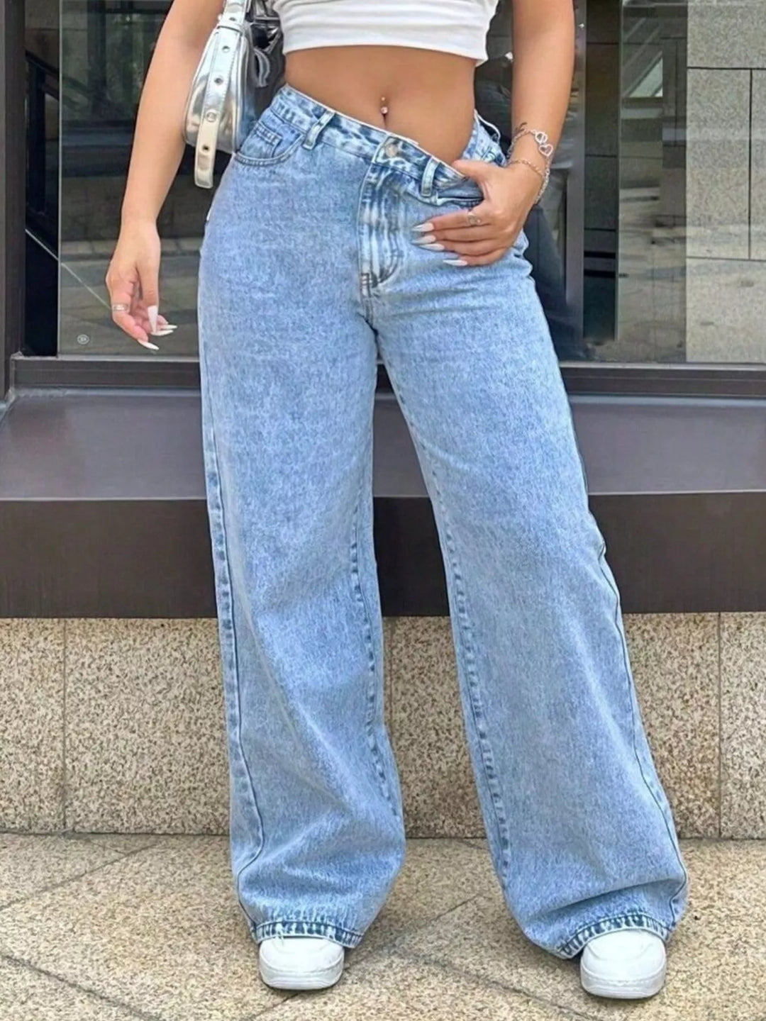 High-rise wide-leg acid-wash jeans with five-pocket detailing