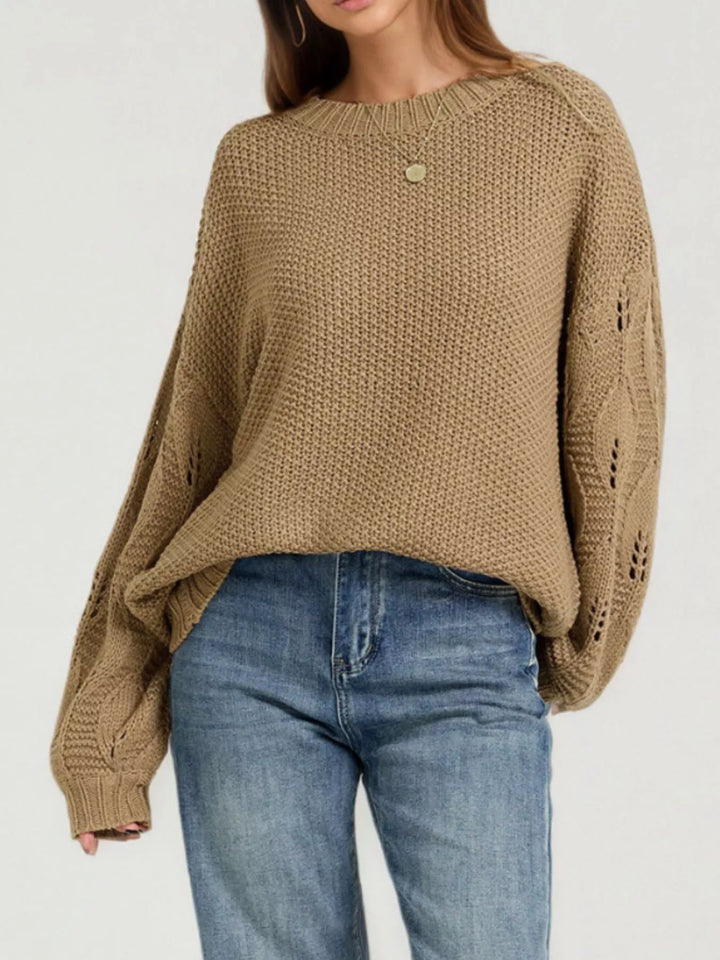 Openwork knit dropped shoulder sweater with curved hem