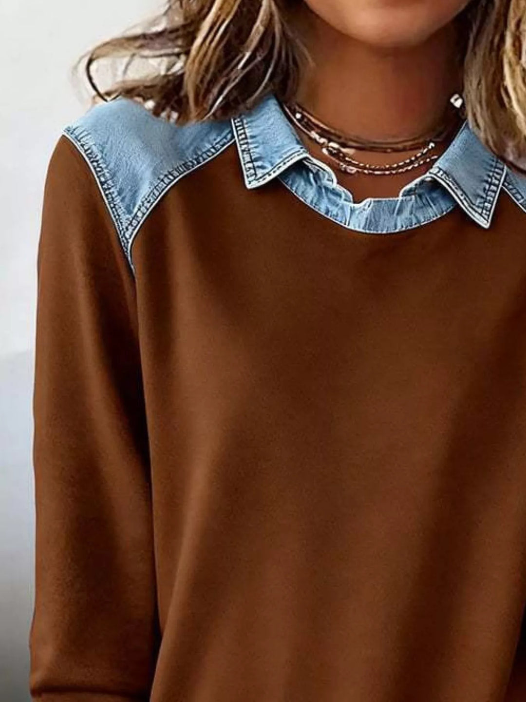 Denim-trim long sleeve crew neck pullover top