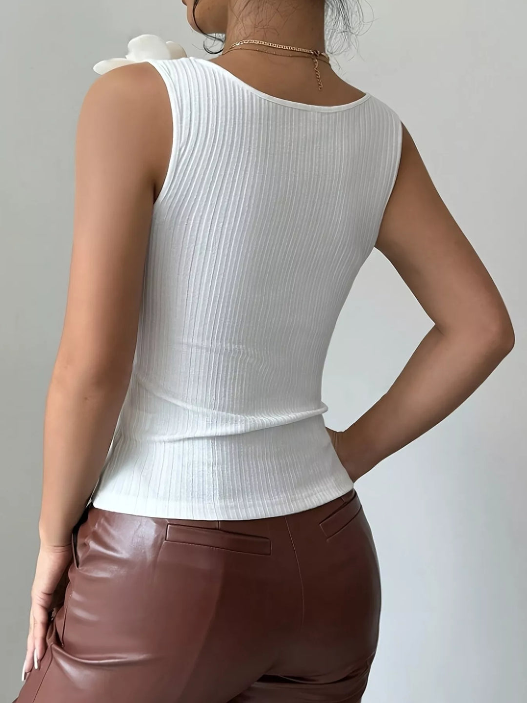 Ribbed knit tank top with 3D floral appliqué straps