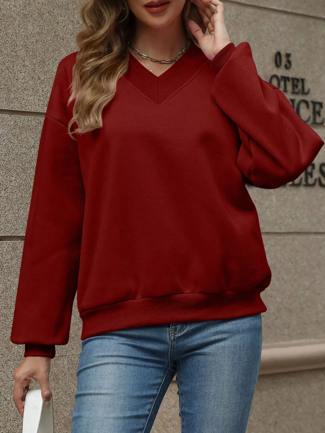V-neck drop-shoulder pullover sweatshirt with ribbed trim