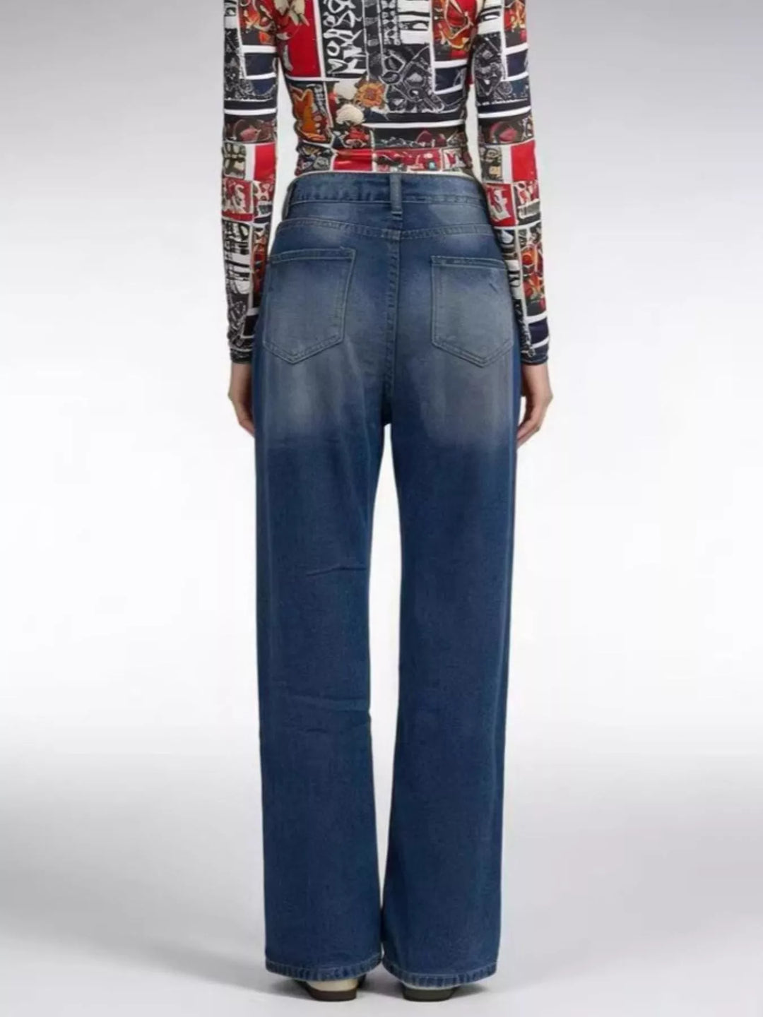 Distressed wide-leg jeans with raw frayed hem