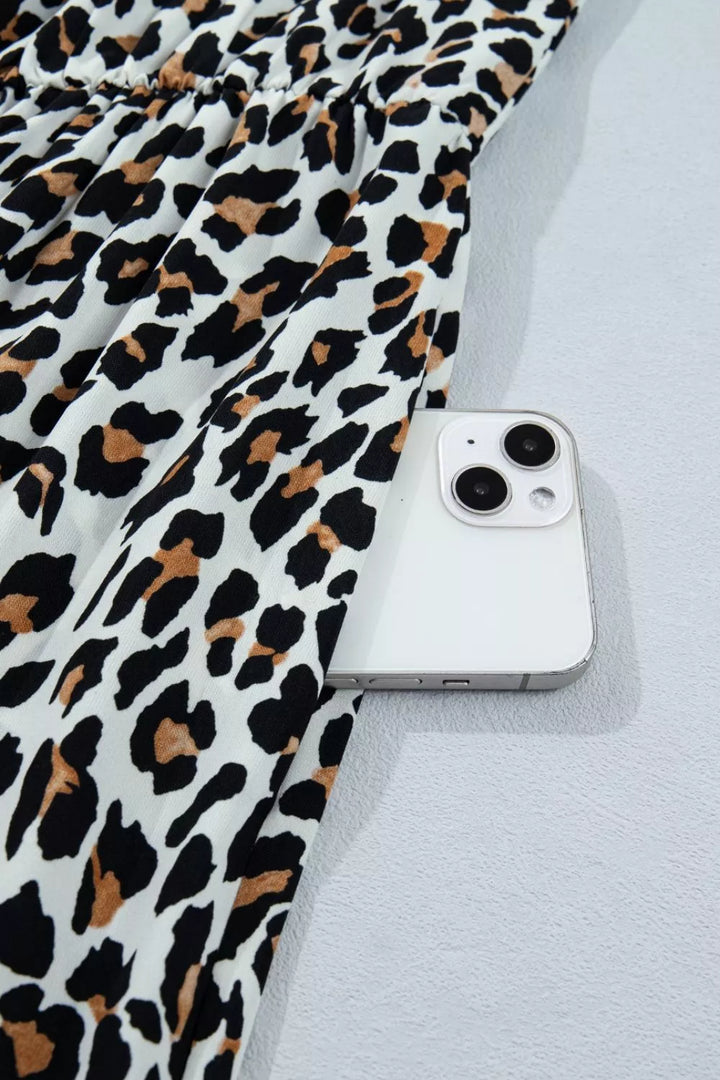 Leopard print tiered midi dress with contrast trim