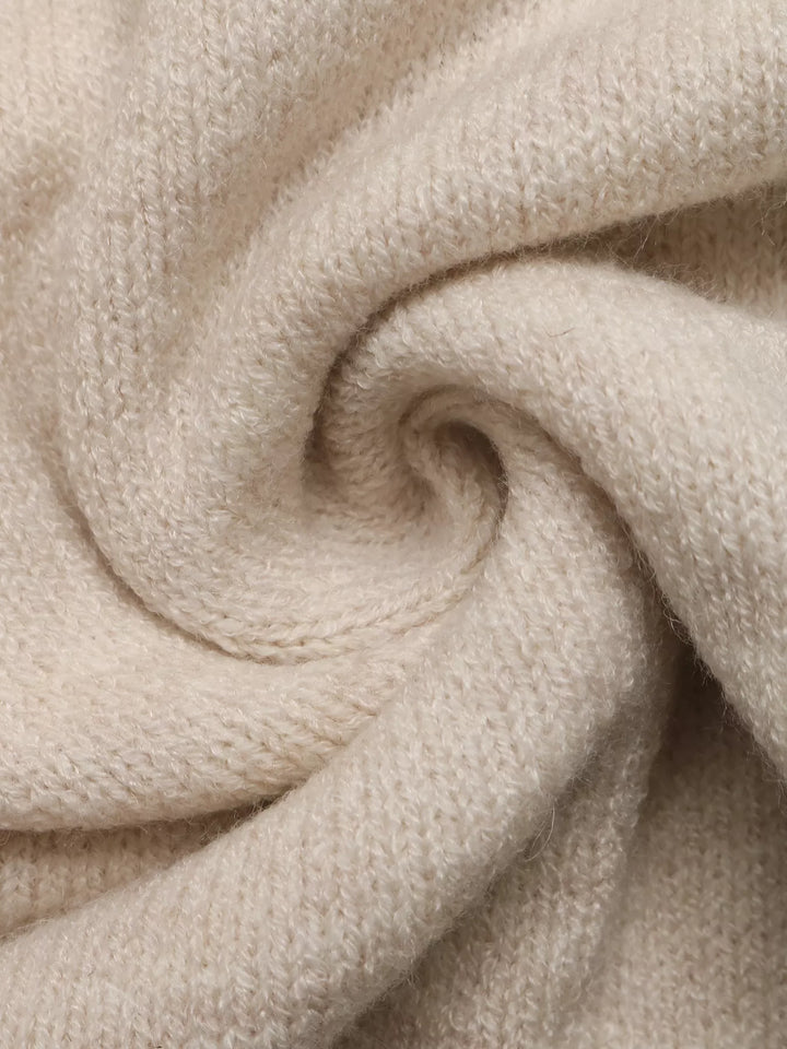 Surplice wrap sweater with side tie and drop shoulders
