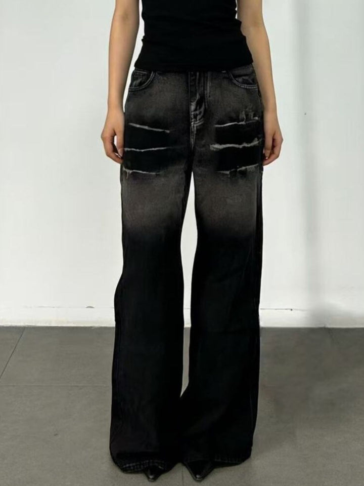 Distressed wide-leg jeans with faded thigh wash