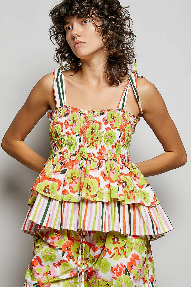 Floral smocked cami with tiered peplum and tie shoulder straps