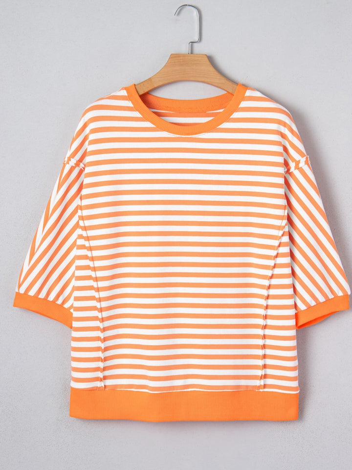 Striped exposed-seam 3/4 sleeve pullover top