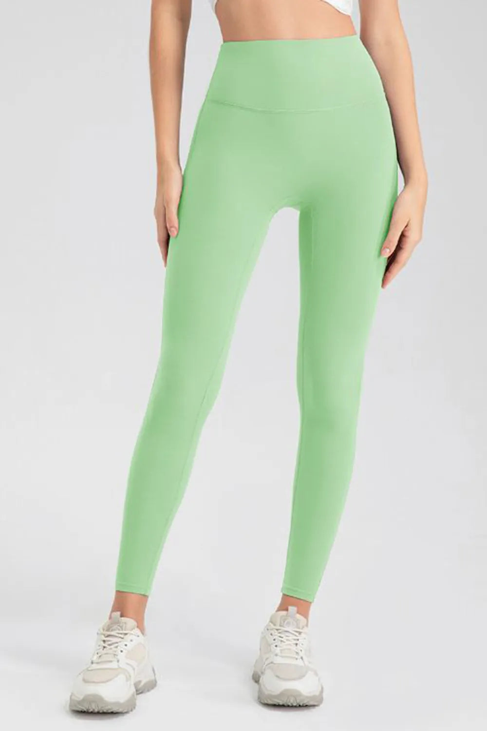 Neon Green High-waisted skinny active leggings with wide waistband